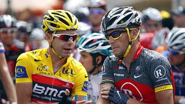 Two men facing mission impossible ... Cadel Evans with Lance Armstrong.
