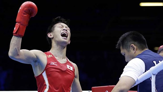 Shock verdict ... Satoshi Shimizu reacts after losing against Azerbaijan's Magomed Abdulhamidov.