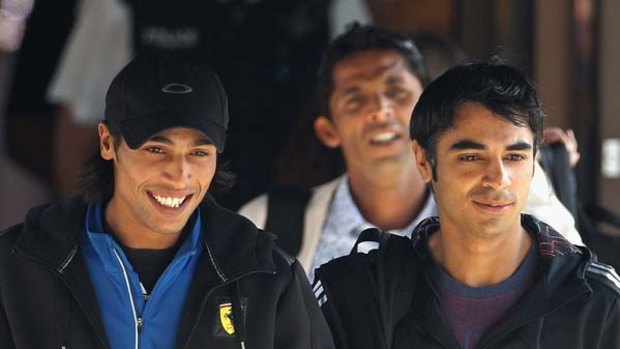 Accused ... Mohammad Amir, left, Salman Butt, right, and Mohammad Asif, behind.