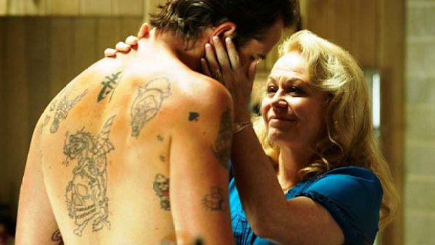 Crime family matriarch ... Jacki Weaver as Janine Cody with her son Craig (Sullivan Stapleton) in Animal Kingdom.