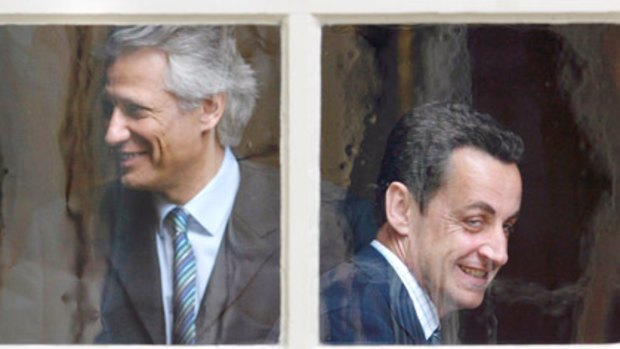 Not smiling now ... Mr de Villepin and Mr Sarkozy.