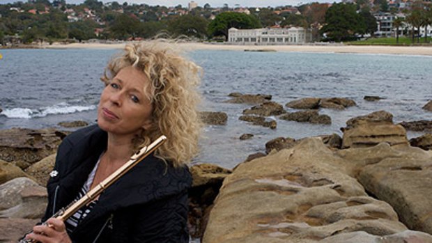 The sound and the parking meter fury  ... flautist Jane Rutter at Balmoral Beach, where she will perform this morning at a rally against meters in Mosman.