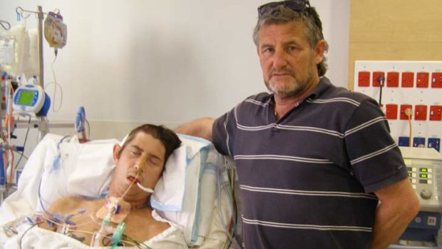 Looking for answers: Peter Mitchell with son Matthew before his death.