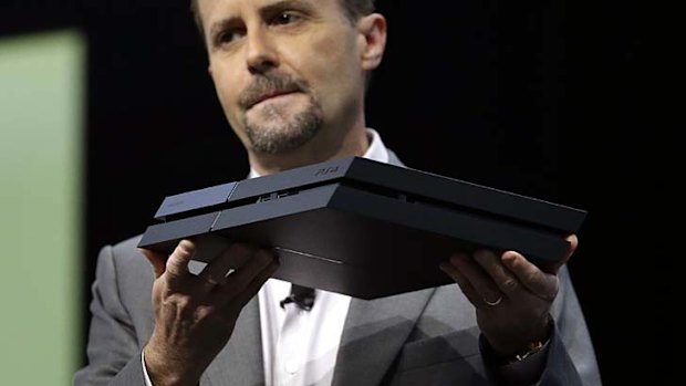 Sony's Andrew House shows off the PlayStation 4.