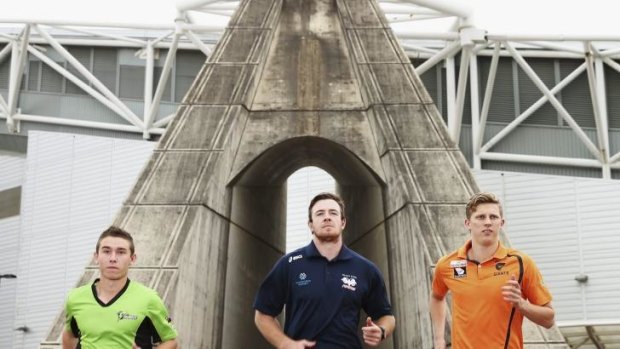 Ready to run: Jake Doran of Sydney Thunder, Jed Holloway of the Rams and Lachie Whitfield of the GWS Giants share a love of jogging.
