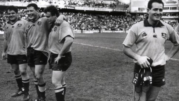 All smiles (from left): Ewen McKenzie, Phil Kearns, Tony Daly and David Campese after Australia beat England in 1991.