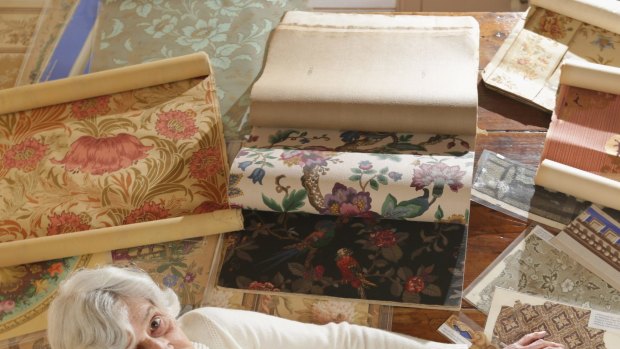 Paper treasure: Phyllis Murphy with a sampling of her wallpaper collection.