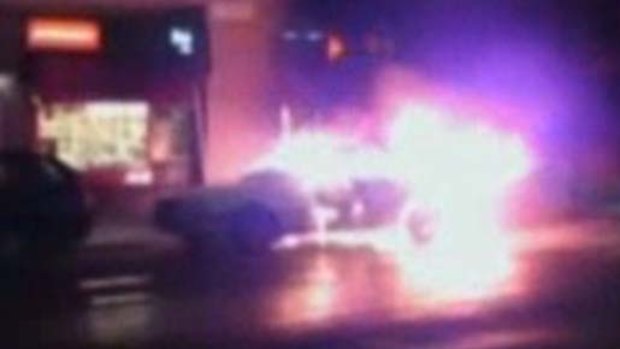 Explosion ... this video grab shows a car on fire in  Stockholm.