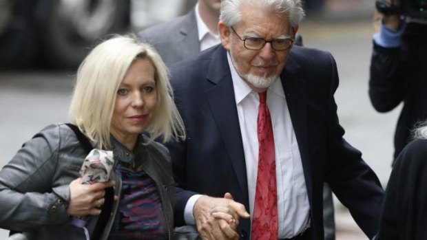 Show of support: Rolf Harris arrives at Southwark Crown Court with his daughter Bindi on Wednesday.
