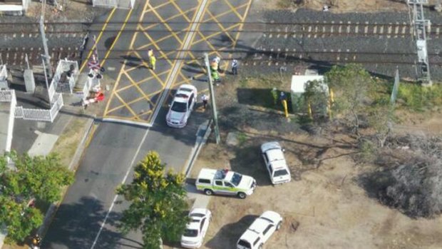 Emergency crews at Cannon Hill level crossing. Photo: Penny Dahl, Australian Traffic Network.