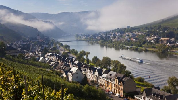 Can't beat it: a cruise boat navigates the Moselle River.