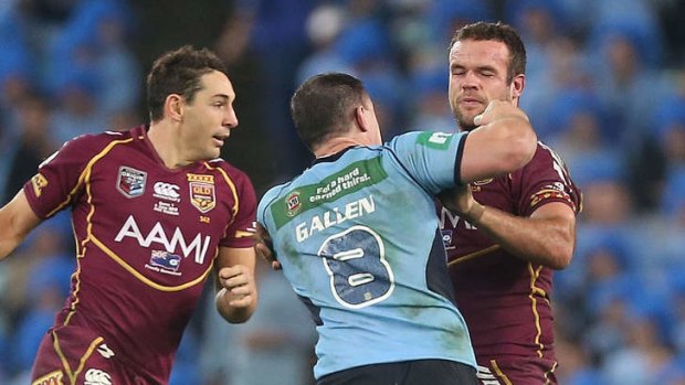 In the ring: Paul Gallen lands his infamous one-two combination on Nate Myles during Origin I.
