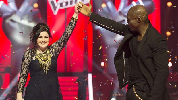 Seal of approval... Karise Eden and her mentor, Seal, celebrate victory in last night's final of <i>The Voice</i>. The show has been a massive ratings hit for Channel Nine, which has already confirmed a second series.
