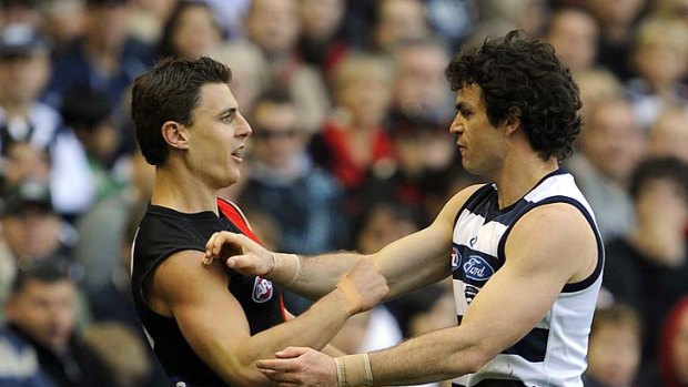 Matthew Lloyd and Scarlett size each other up in Round 9 of the 2009 season.