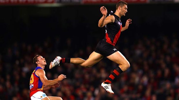 Gliding home: Essendon ruckman Tom Bellchambers takes to the air on his way to 21 disposals and 26 hit-outs.