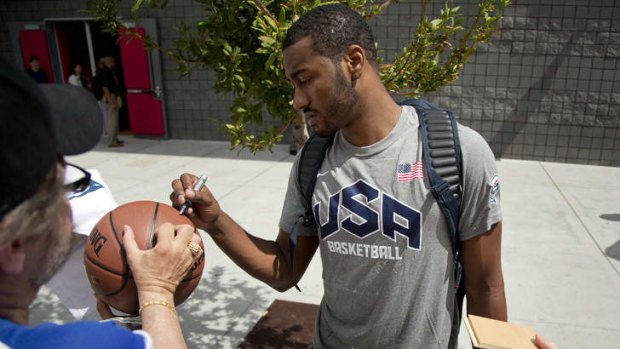 Big future: John Wall of the Washington Wizards signs autographs for fans after a USA Basketball mini camp practice in Las Vegas.