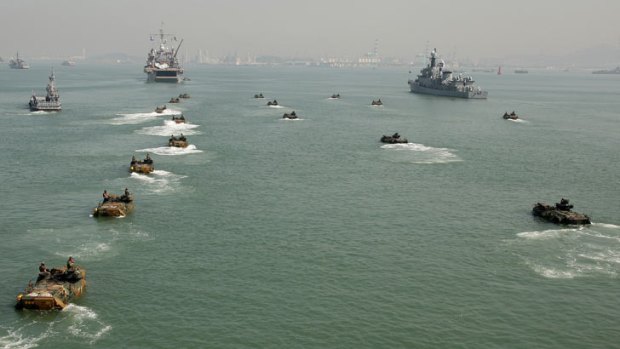 Amphibious vehicles take part in a landing operation in the sea off Incheon, west of Seoul on September 15, 2010 as South Korea, the United States and Australia re-enacted the daring Incheon Landing, led by US General Douglas MacArthur 60 years beforehand.