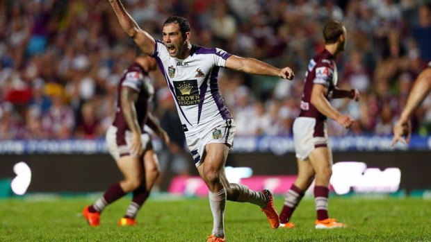 Cameron Smith celebrates his winning drop goal in golden point extra time.