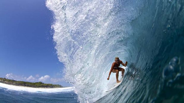 Surf guide Amy Kotch takes on one of the world's great left-hand breaks, Lohis, in the Maldives.