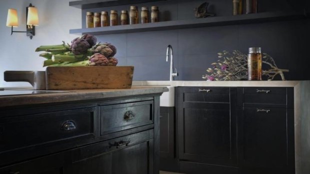 Patricia Stewart's kitchen includes a salvaged antique baker's shop counter.