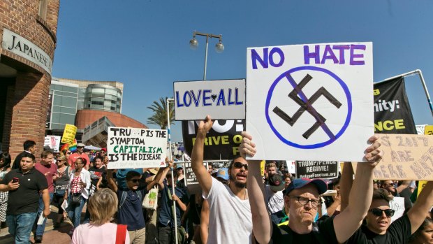 Demonstrators in Los Angeles decry hatred and racism. 