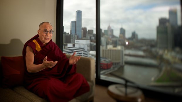 No sightseeing: the Dalai Lama offers sage words on his arrival in Melbourne yesterday.