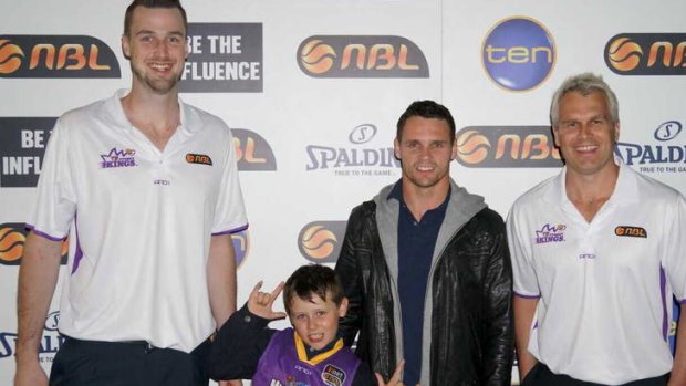 Talk it up: Sydney's standout off-season recruit A.J. Ogilvy, world champion boxer Daniel Geale and his son Bailey, and Sydney Kings coach Shane Heal at the NBL season launch on Thursday night.
