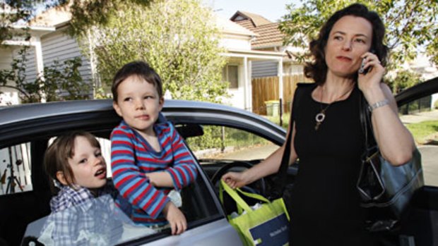 Despite living in the inner city, Giulia Baggio, pictured with children Alessandra and James, gets stressed about the amount of time she spends in the car.
