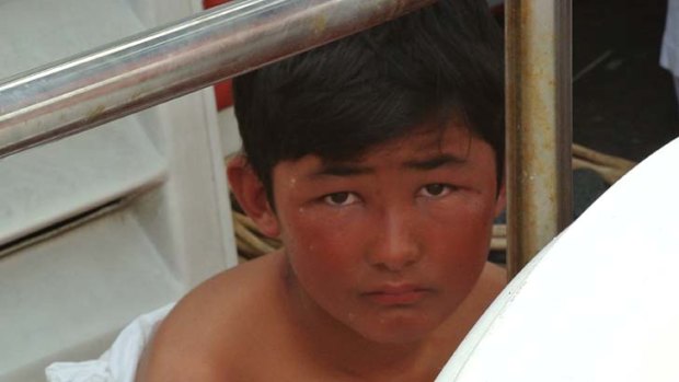 Heartbroken ... Omed, whose father died in the tragedy, on the deck of an Indonesian search and rescue vessel at Merak.