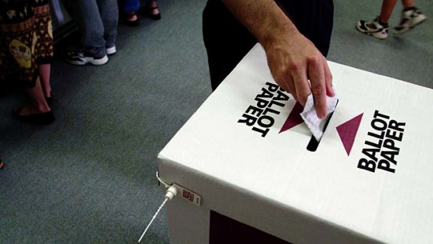 Prime Minister Julia Gillard urged voters to reject any move to end compulsory voting in Queensland.
