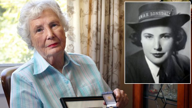 "Forgotten army" ... Joan Turnour with the certificate and medal sent from the British government, and as a young codebreaker during the war.