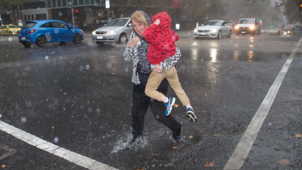 picture by Jason South Age News 9/5/2016 Wild weather hits Melbourne. Heavy rain in Lonsdale street today. #weather #rain #winter