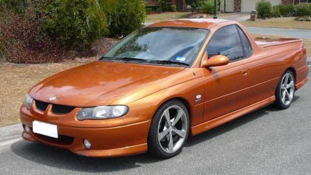 The man was driving a gold-coloured Holden ute.
