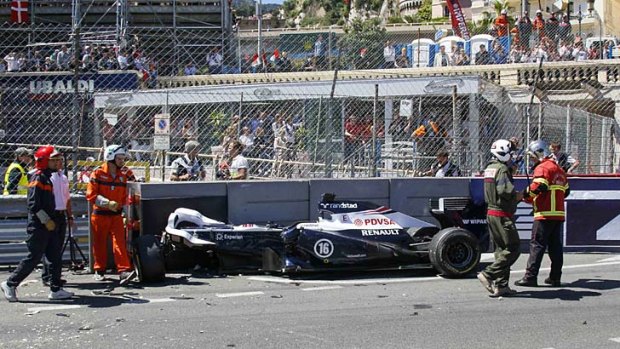 The car of Williams Formula One driver Pastor Maldonaldo of Venezuela is seen after a crash.