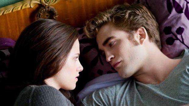 Kristen Stewart, left, and Robert Pattinson are shown in a scene from, "The Twilight Saga: Eclipse."