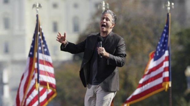 Jon Stewart shouts to the crowd during the Rally to Restore Sanity and/or Fear on the National Mall in Washington.