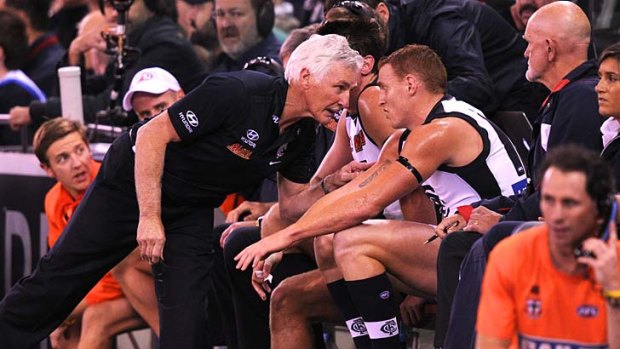 Close encounters of the AFL kind: Carlton's Mitch Robinson gets a spray from coach Mick Malthouse during the second quarter.