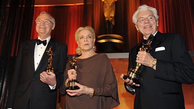 Early honours  ... Lauren Bacall with filmmaker Roger Corman, left, and cinematographer Gordon Willis and their honorary Oscars.