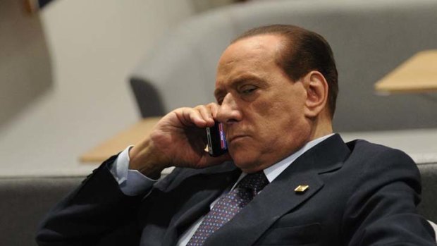 Silvio Berlusconi ... making concessions.