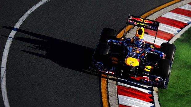 Spectacle: Mark Webber drives around the Australian Grand Prix circuit at Albert Park in Melbourne.