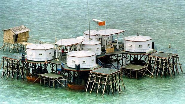 A Chinese flag is prominently displayed in a structure built by China in one of the islands in the Spratlys, in the South China Sea.