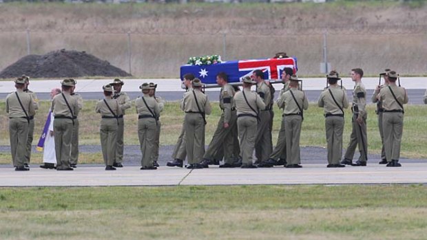 A ramp ceremony at Tullamarine Airport for two soldiers killed in Afghanistan.