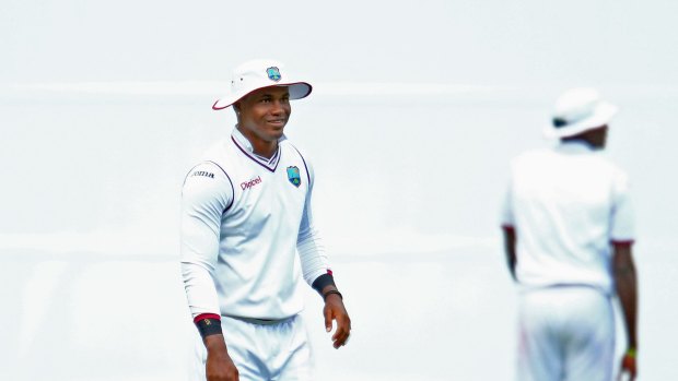 Oh well: West Indies' Marlon Samuels reacts after dropping a catch.