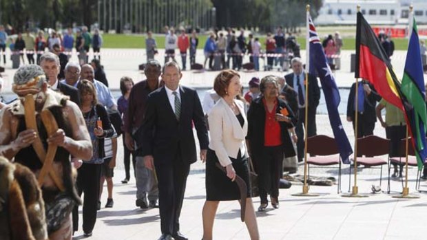Tony Abbott and Julia Gillard at the Welcome to Country ceremony.