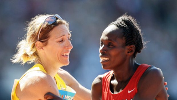 Grandstand finish ... Australia's Kerryn McCann and Kenyan Hellen Cherono Koskei congratulate each other after an epic finish to the marathon at the 2006 Melbourne Games.