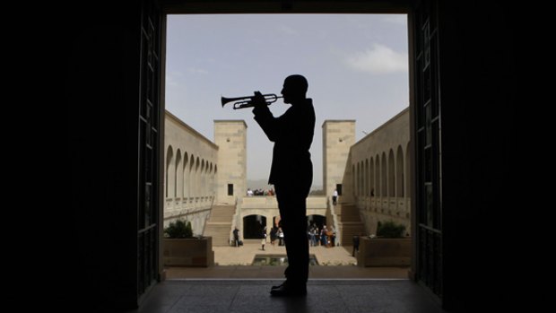 The Last Post is sounded at the Australian War Memorial in Canberra.