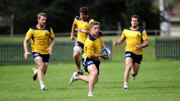 Brumbies flanker Michael Hooper, pictured at training yesterday, had to be quarantined from his teammates in the lead-up to his heroic performance against the Highlanders.