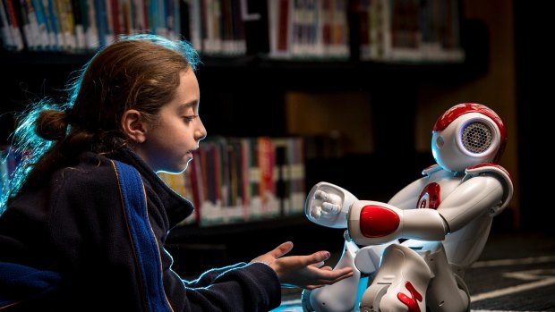 Grade 4 student Romy Szmulewicz with robot Rosey at the Biallik College. 7 November 2016. The Age NEWS. Photo: Eddie Jim.
