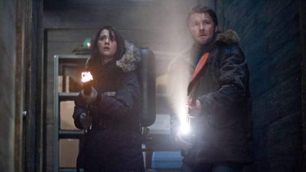 Mary Elizabeth Winstead and Joel Edgerton in The Thing