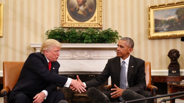 President Barack Obama shakes hands with president-elect Donald Trump in the Oval Office.